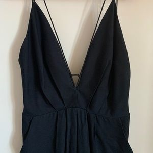 Black, deep back romper